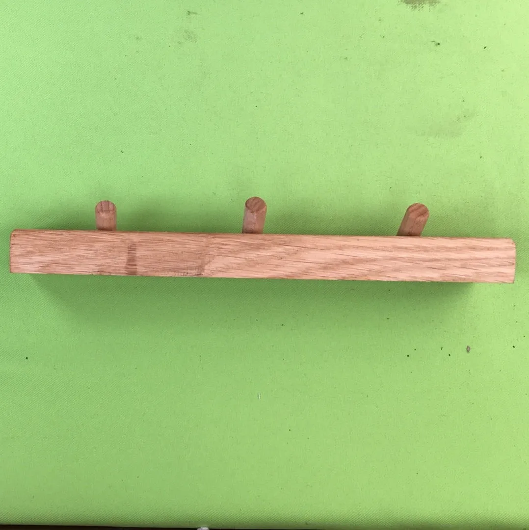 Small coat rack made from oak and hardwood dowels. Oiled. 9106 5175